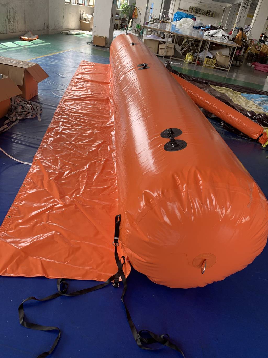 Inflatable flood barrier